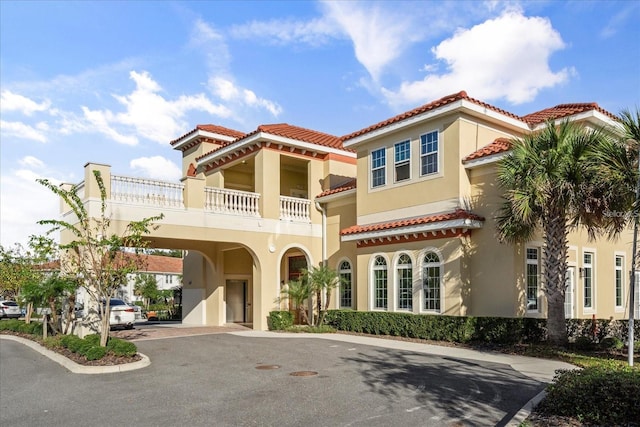 2710 Bolzano Dr, Apopka, FL 32712 - view of building exterior featuring a carport and driveway