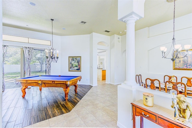 2626 Greenwillow Dr, Orlando, FL 32825 - playroom with a chandelier, decorative columns, pool table, baseboards, and light tile patterned flooring