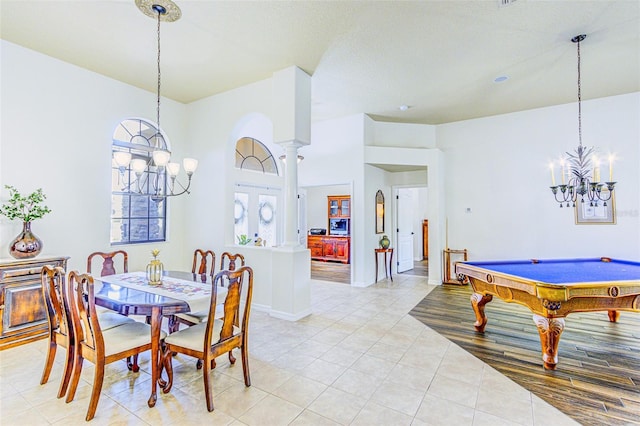 2626 Greenwillow Dr, Orlando, FL 32825 - dining space featuring a chandelier, light tile patterned floors, billiards, and baseboards