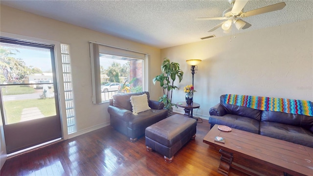 340 Zelda Blvd, Daytona Beach, FL 32118 - living area featuring wood finished floors, a textured ceiling, a ceiling fan, and baseboards