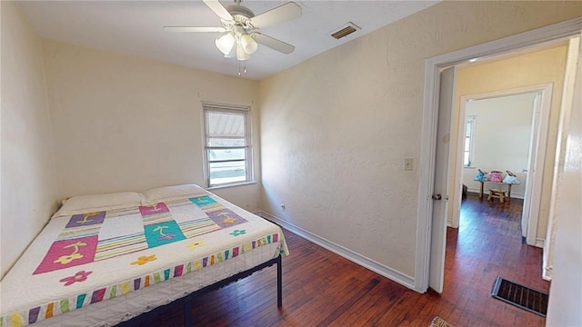 340 Zelda Blvd, Daytona Beach, FL 32118 - bedroom with hardwood / wood-style flooring, baseboards, a ceiling fan, and a textured wall