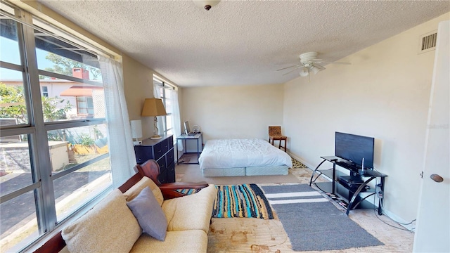 340 Zelda Blvd, Daytona Beach, FL 32118 - bedroom featuring a textured ceiling and light colored carpet