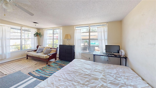 340 Zelda Blvd, Daytona Beach, FL 32118 - bedroom featuring a textured ceiling, ceiling fan, and wood finished floors