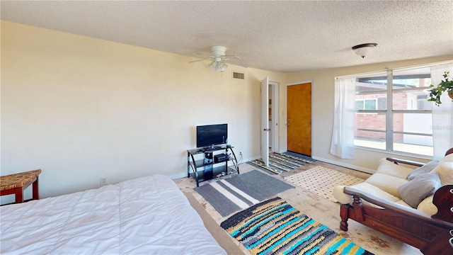 340 Zelda Blvd, Daytona Beach, FL 32118 - bedroom featuring baseboards, a textured ceiling, and ceiling fan