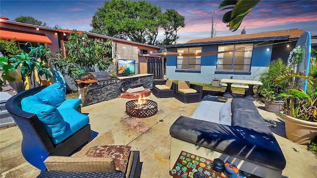 340 Zelda Blvd, Daytona Beach, FL 32118 - view of patio featuring an outdoor living space with a fire pit and an outdoor kitchen
