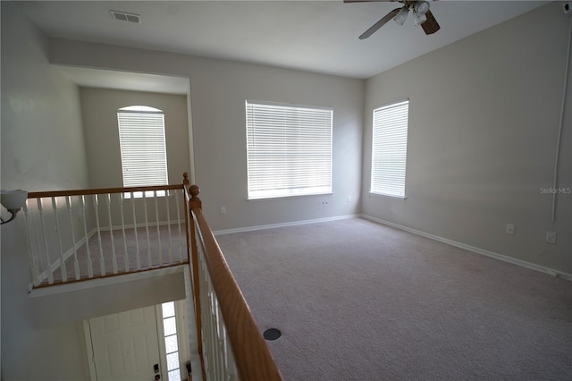 13520 Meadow Bay Loop, Orlando, FL 32824 - carpeted spare room featuring baseboards, visible vents, and a ceiling fan