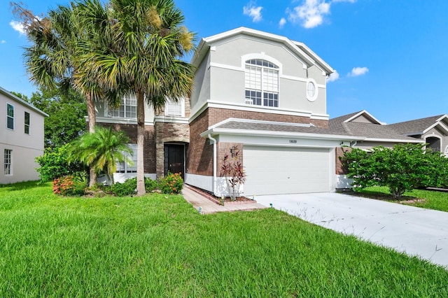 13520 Meadow Bay Loop, Orlando, FL 32824 - view of front of home with a garage, concrete driveway, a front yard, and brick siding
