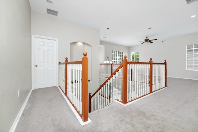 13520 Meadow Bay Loop, Orlando, FL 32824 - hall with an upstairs landing, carpet floors, a chandelier, and recessed lighting
