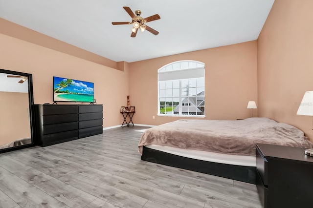 13520 Meadow Bay Loop, Orlando, FL 32824 - bedroom with wood finished floors and a ceiling fan
