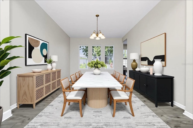 13520 Meadow Bay Loop, Orlando, FL 32824 - dining area with a chandelier and vaulted ceiling