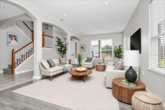 13520 Meadow Bay Loop, Orlando, FL 32824 - living room featuring stairs and recessed lighting