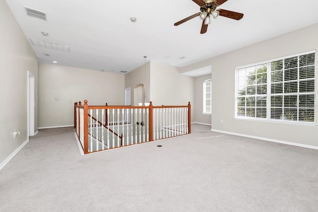 13520 Meadow Bay Loop, Orlando, FL 32824 - empty room with carpet floors and ceiling fan