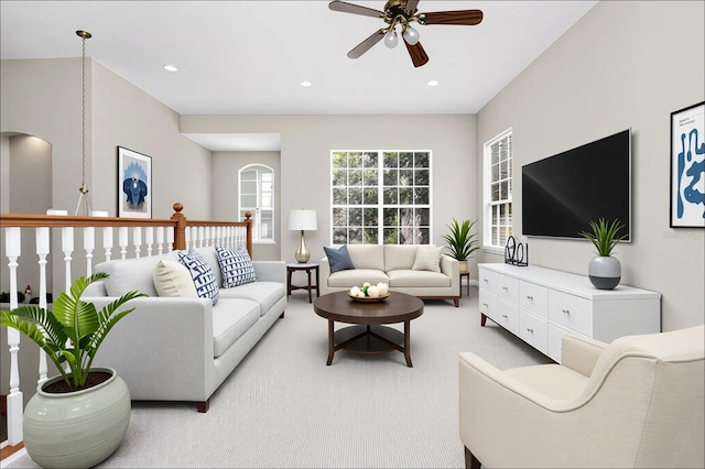 13520 Meadow Bay Loop, Orlando, FL 32824 - living room featuring ceiling fan, recessed lighting, and light carpet