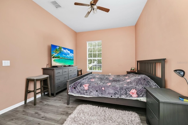 13520 Meadow Bay Loop, Orlando, FL 32824 - bedroom with wood finished floors and ceiling fan