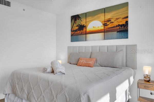 13427 Blue Heron Beach Dr Unit 1205, Orlando, FL 32821 - bedroom featuring visible vents