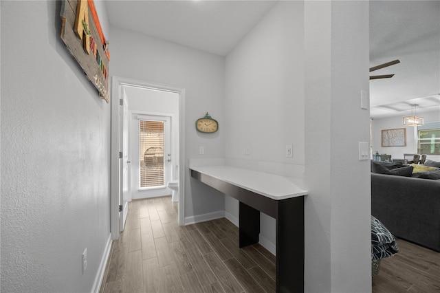 12048 Imaginary Way, Orlando, FL 32832 - corridor featuring baseboards and dark wood-style flooring