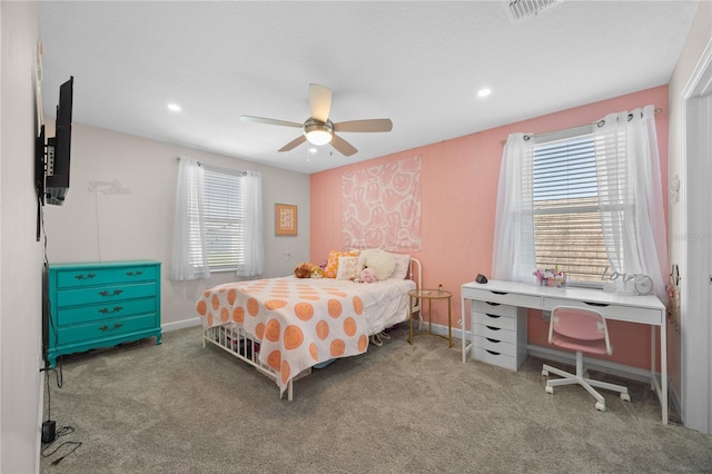 12048 Imaginary Way, Orlando, FL 32832 - bedroom featuring carpet floors, visible vents, and multiple windows