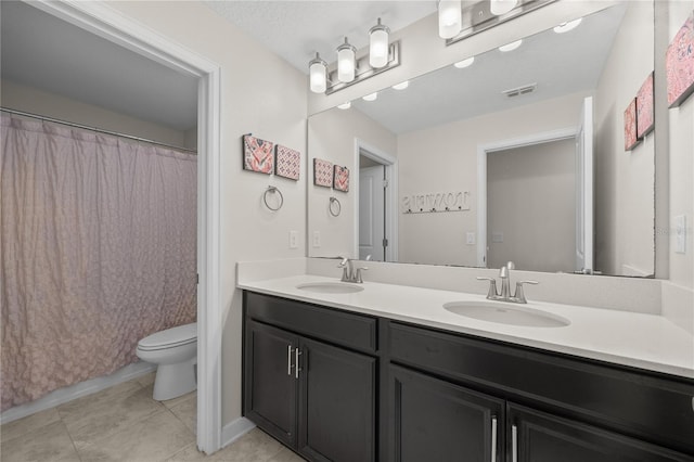 12048 Imaginary Way, Orlando, FL 32832 - full bath featuring toilet, a sink, visible vents, and double vanity