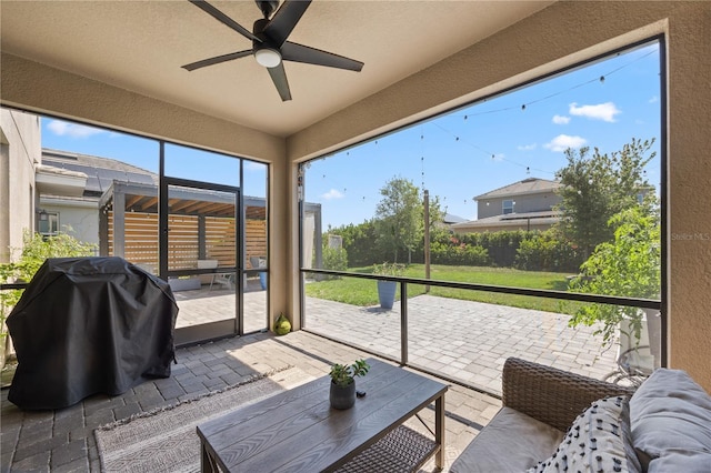 12048 Imaginary Way, Orlando, FL 32832 - sunroom / solarium featuring a ceiling fan