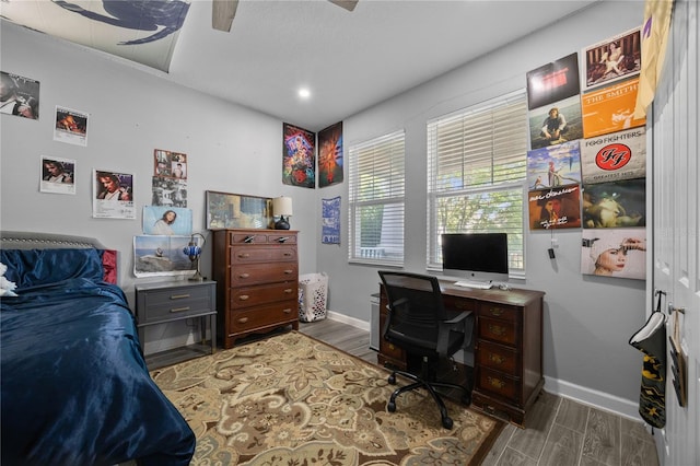 12048 Imaginary Way, Orlando, FL 32832 - bedroom featuring baseboards, wood finished floors, recessed lighting, and ceiling fan