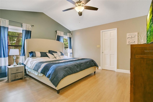 400 Shelby Ct, Apopka, FL 32712 - bedroom with light wood-type flooring, lofted ceiling, baseboards, and a ceiling fan