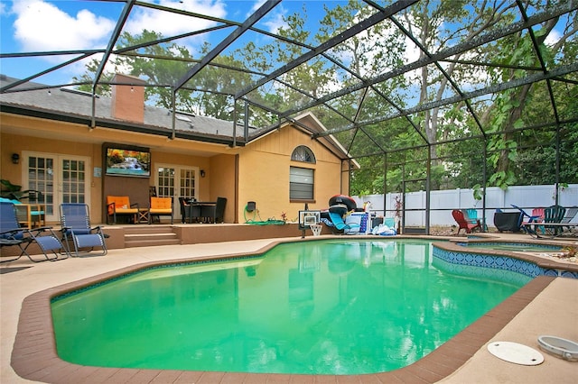 400 Shelby Ct, Apopka, FL 32712 - view of swimming pool with a patio area, glass enclosure, fence, and a pool with connected hot tub