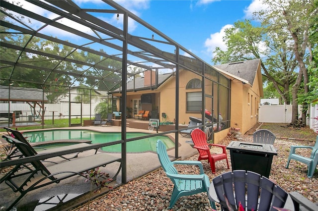 400 Shelby Ct, Apopka, FL 32712 - view of swimming pool with an outdoor fire pit, a fenced backyard, a patio, a hot tub, and glass enclosure