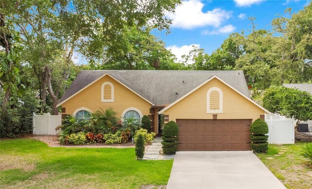 400 Shelby Ct, Apopka, FL 32712 - view of front of property with a garage, concrete driveway, cooling unit, and a shingled roof