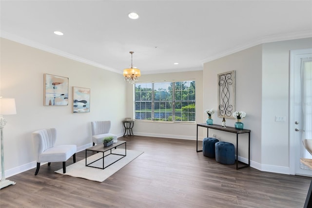1565 Corkery Ct, Winter Springs, FL 32708 - sitting room with a notable chandelier, baseboards, crown molding, and wood finished floors