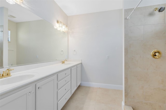 1565 Corkery Ct, Winter Springs, FL 32708 - bathroom with a tile shower, double vanity, a sink, and baseboards
