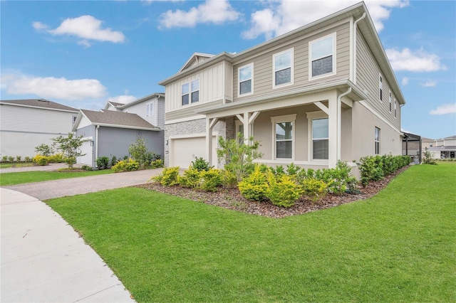 13640 Haulover Beach Ln, Orlando, FL 32827 - view of front of house featuring driveway, a front yard, and a garage