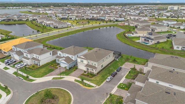 13640 Haulover Beach Ln, Orlando, FL 32827 - bird's eye view featuring a water view and a residential view