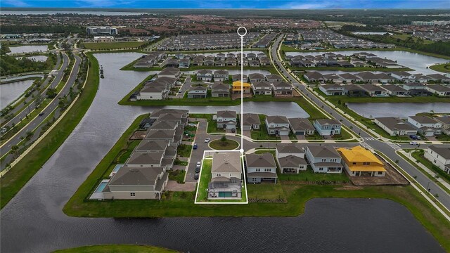 13640 Haulover Beach Ln, Orlando, FL 32827 - aerial view featuring a water view and a residential view