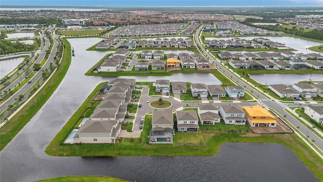 13640 Haulover Beach Ln, Orlando, FL 32827 - birds eye view of property featuring a water view and a residential view