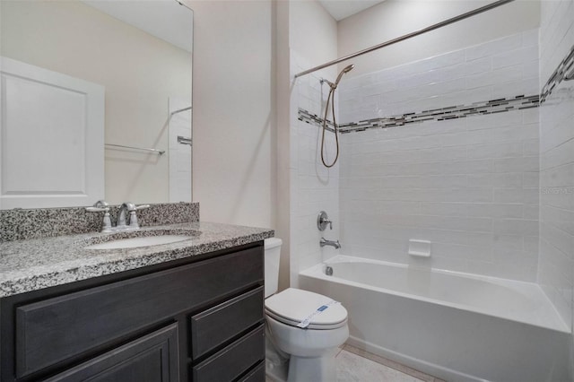 full bathroom featuring toilet, vanity, and washtub / shower combination