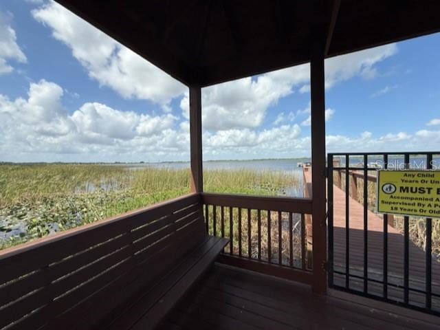 deck featuring a water view