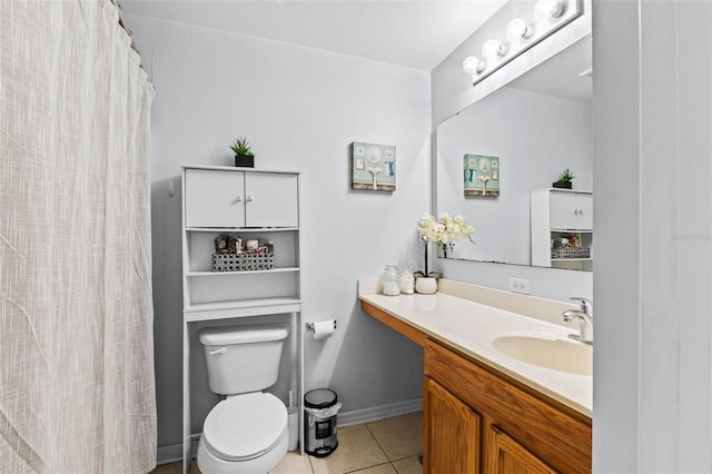 bathroom with vanity, baseboards, curtained shower, tile patterned floors, and toilet