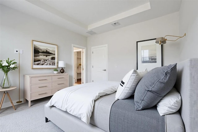 7772 Sweet Star Ave, Orlando, FL 32836 - bedroom with a tray ceiling, light colored carpet, and visible vents