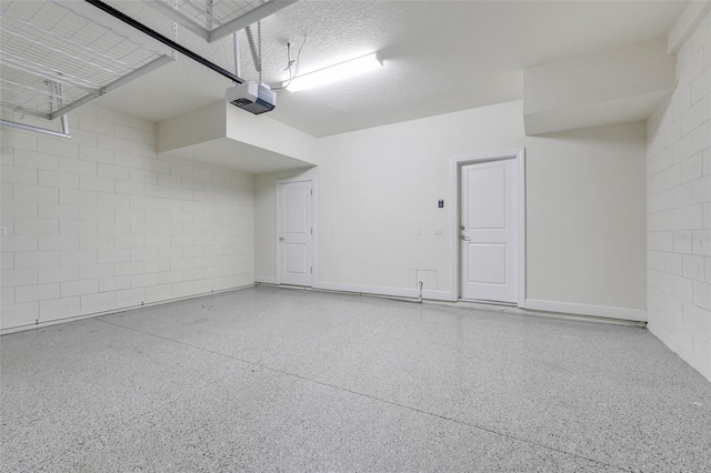 7772 Sweet Star Ave, Orlando, FL 32836 - garage featuring concrete block wall and a garage door opener