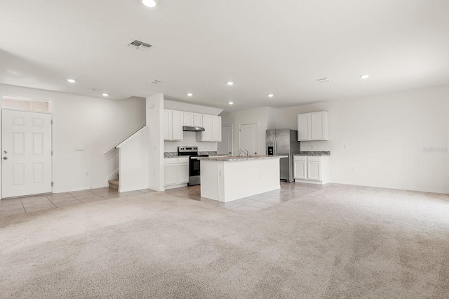 715 Chinoy Rd, Davenport, FL 33837 - unfurnished living room featuring recessed lighting, visible vents, and light colored carpet