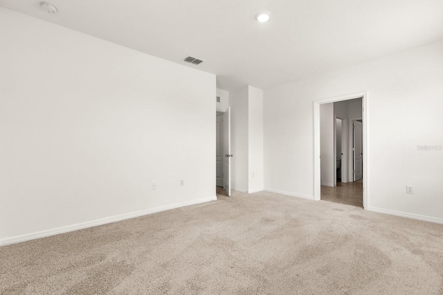 715 Chinoy Rd, Davenport, FL 33837 - unfurnished bedroom featuring visible vents, baseboards, recessed lighting, and light carpet
