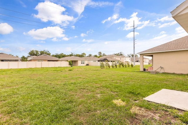 715 Chinoy Rd, Davenport, FL 33837 - view of yard with fence and a residential view