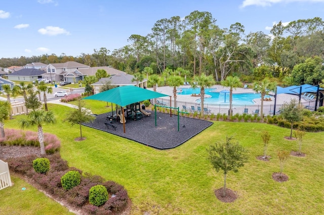 715 Chinoy Rd, Davenport, FL 33837 - community jungle gym with a yard, a residential view, and fence