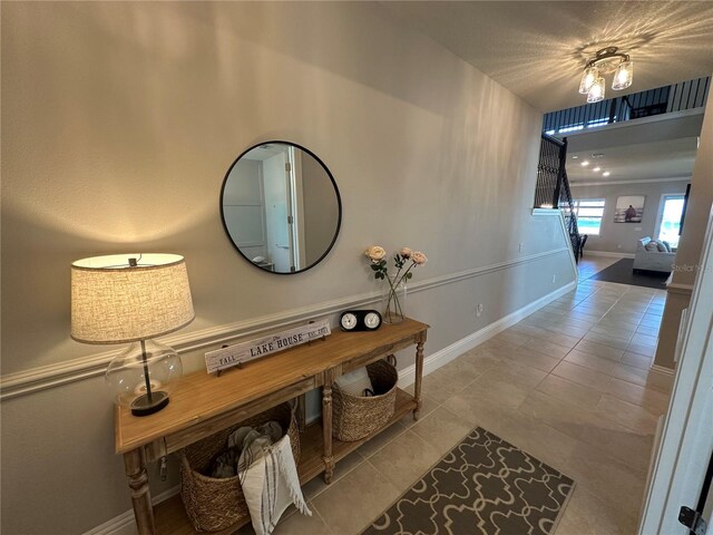 3399 Buoy Cir, Winter Garden, FL 34787 - corridor with tile patterned floors and baseboards