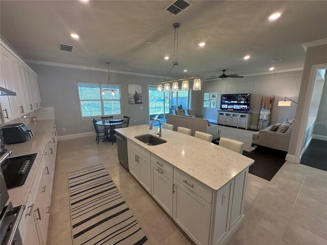 3399 Buoy Cir, Winter Garden, FL 34787 - kitchen featuring stainless steel dishwasher, visible vents, ornamental molding, and a sink
