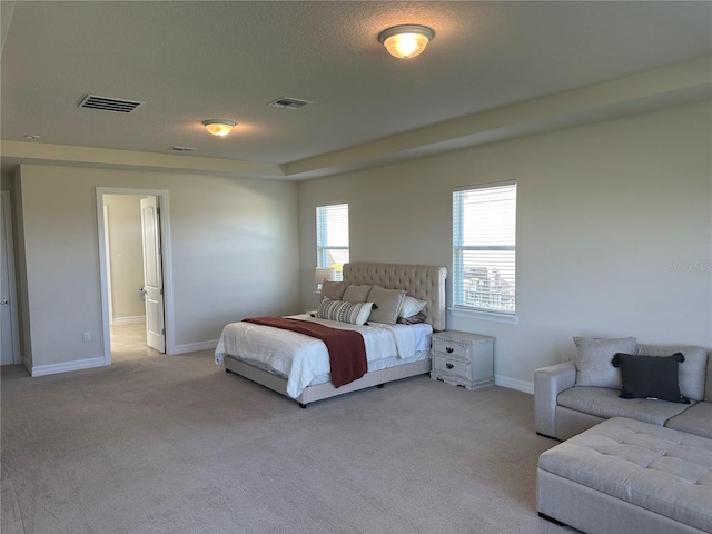 3399 Buoy Cir, Winter Garden, FL 34787 - carpeted bedroom with a textured ceiling, baseboards, and visible vents