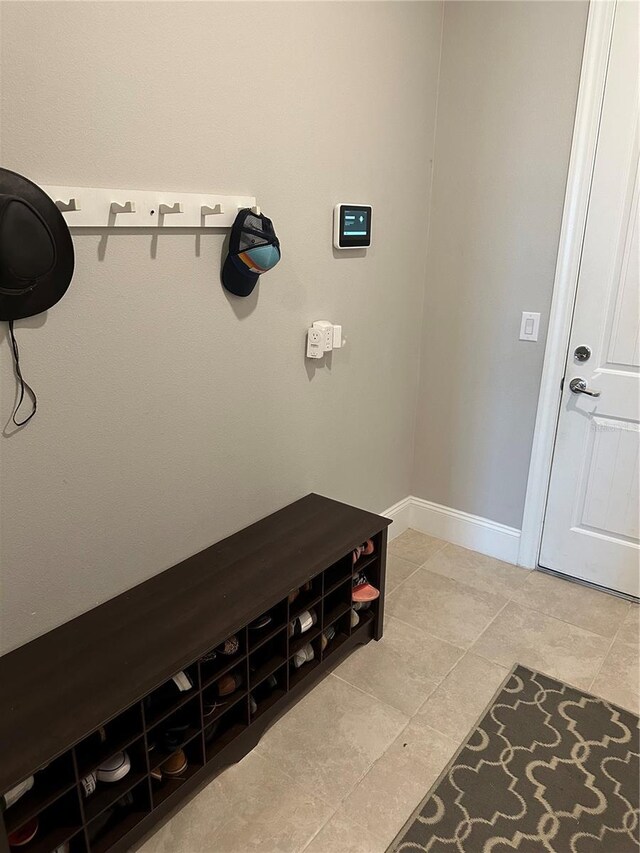 3399 Buoy Cir, Winter Garden, FL 34787 - mudroom featuring light tile patterned flooring and baseboards