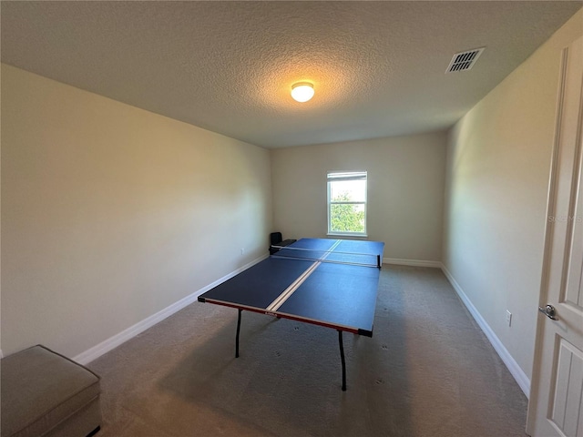 3399 Buoy Cir, Winter Garden, FL 34787 - recreation room featuring carpet floors, a textured ceiling, baseboards, and visible vents