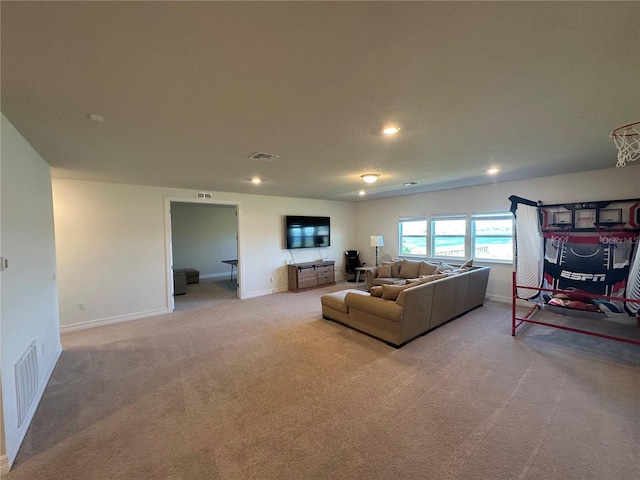 3399 Buoy Cir, Winter Garden, FL 34787 - living room featuring recessed lighting, light carpet, baseboards, and visible vents