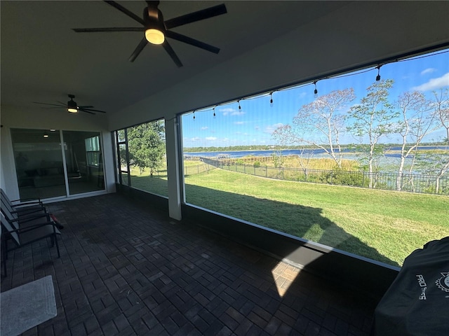3399 Buoy Cir, Winter Garden, FL 34787 - unfurnished sunroom featuring a ceiling fan